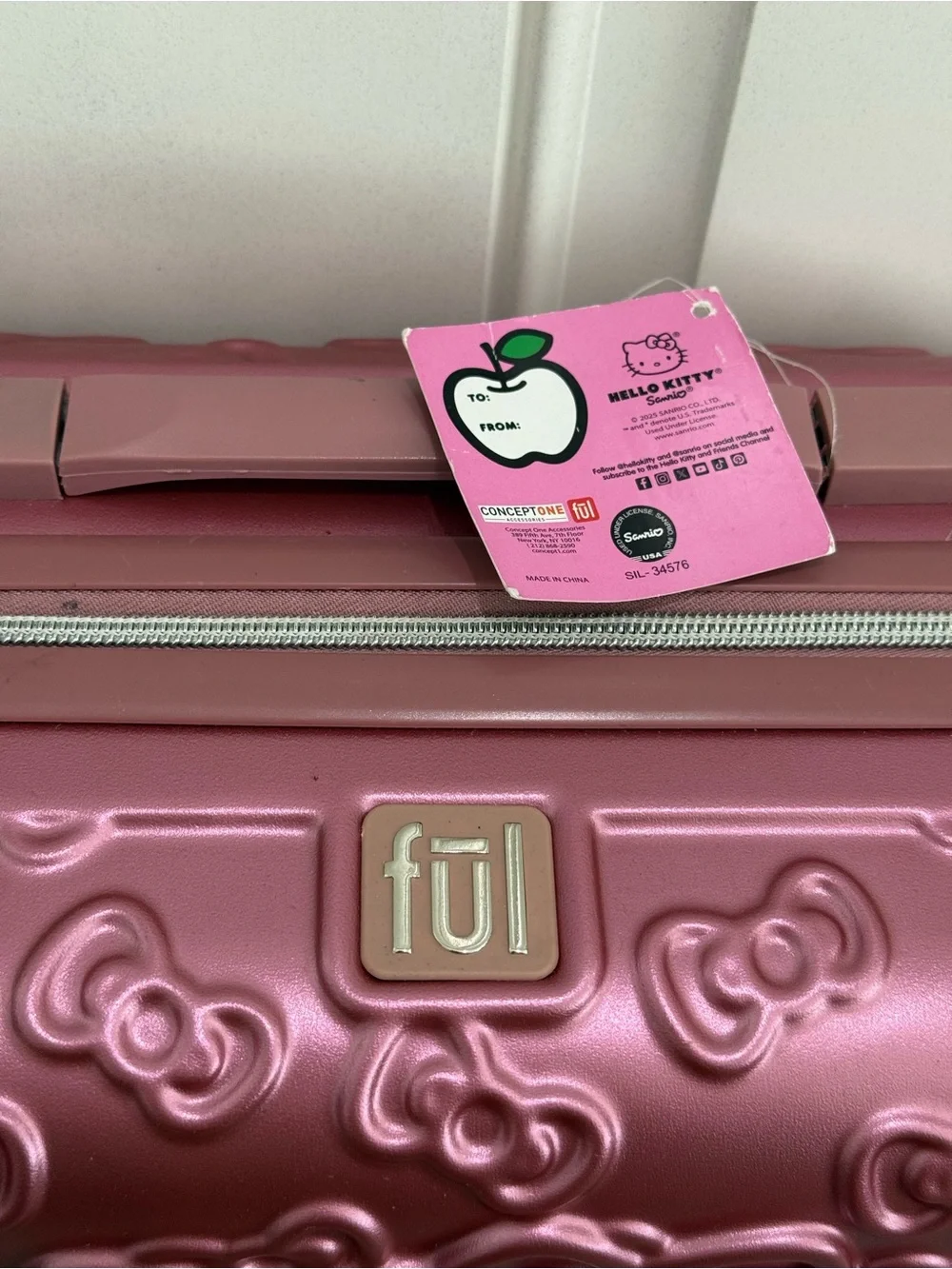 NWT FŪL Hello Kitty 13” Metallic Pink Hardshell Suitcase w/Logo Design
